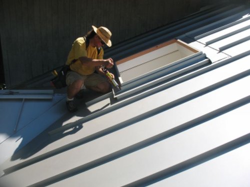 Aluminum Standing Seam Roof Installation w/Skylight Classic Metal Roofs LLC Re-Roof Project image 1