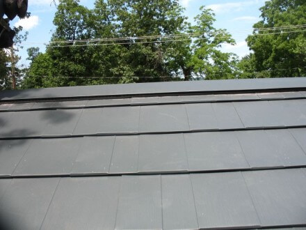 The gray color metal roof in house at Stow, MA