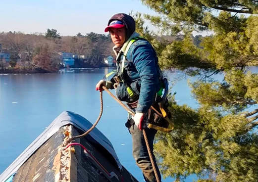 metal roof installer with safety gear