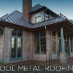 A cedar house with a metal standing seam cool roof in MA, CT, NH, or RI