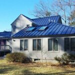 A home with a standing seam metal roof in North Reading, MA.