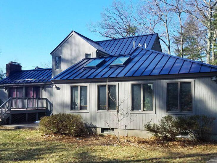 A home with a standing seam metal roof in North Reading, MA.