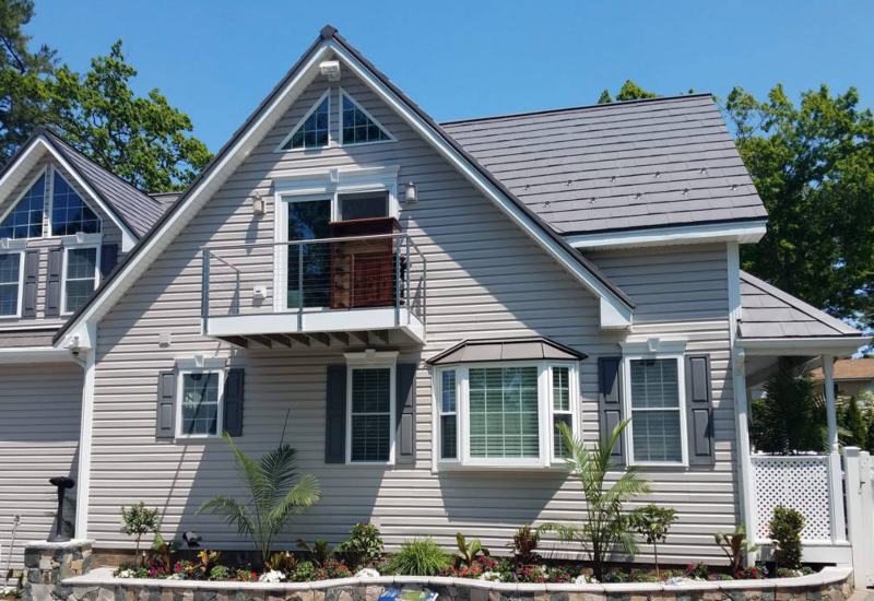 a metal roof on a home in the spring