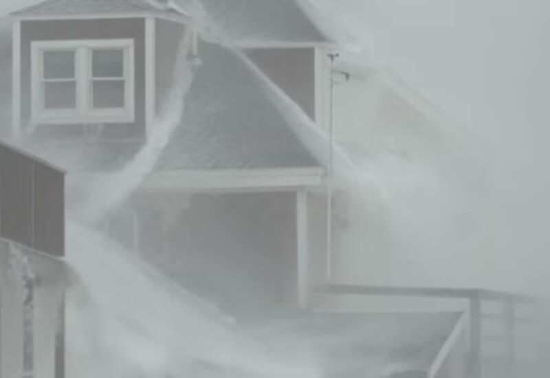 metal roof on a red house in a hurricane in RI, CT, MA or NH