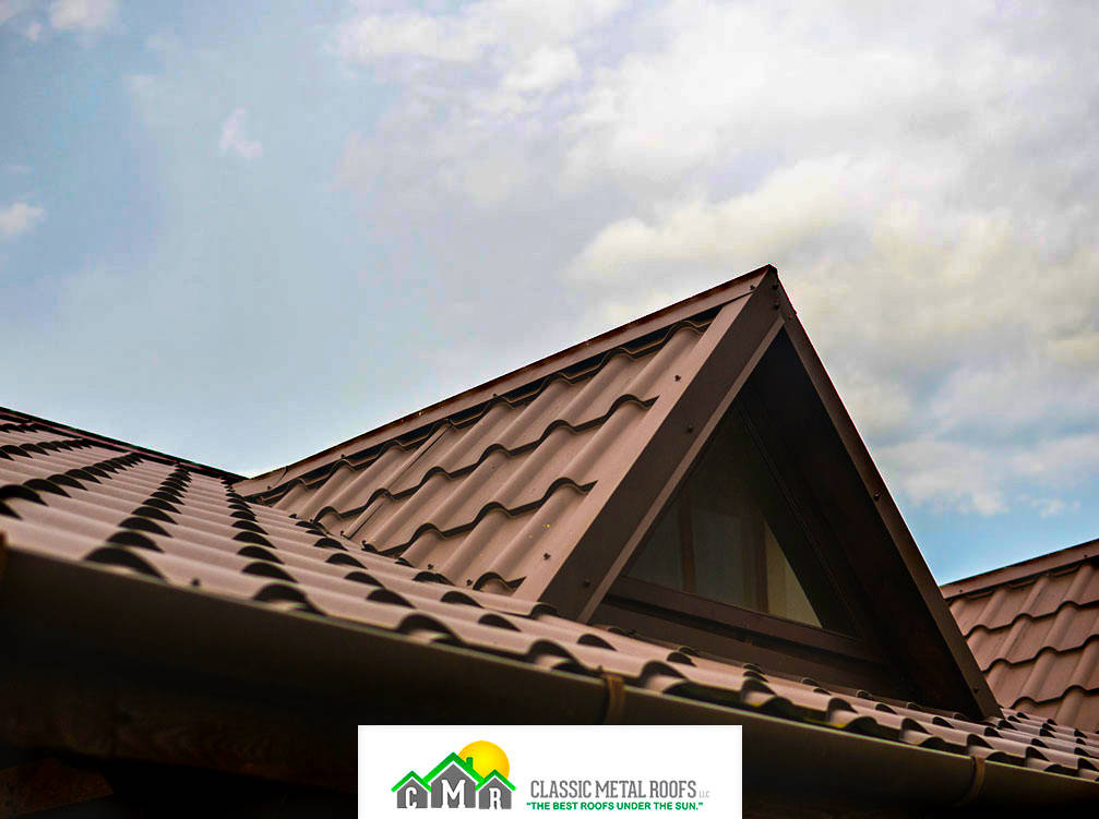 A dark red/brown metal roof made with recyclable aluminum in Southern New England