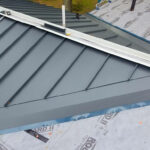 grey metal roofs in MA, CT, NH, and RI are environmentally friendly and last a lifetime