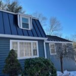 Blue color roof in residential place in Rhode Island