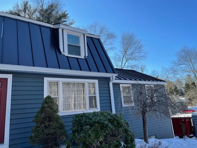 Blue color roof in residential place in Rhode Island