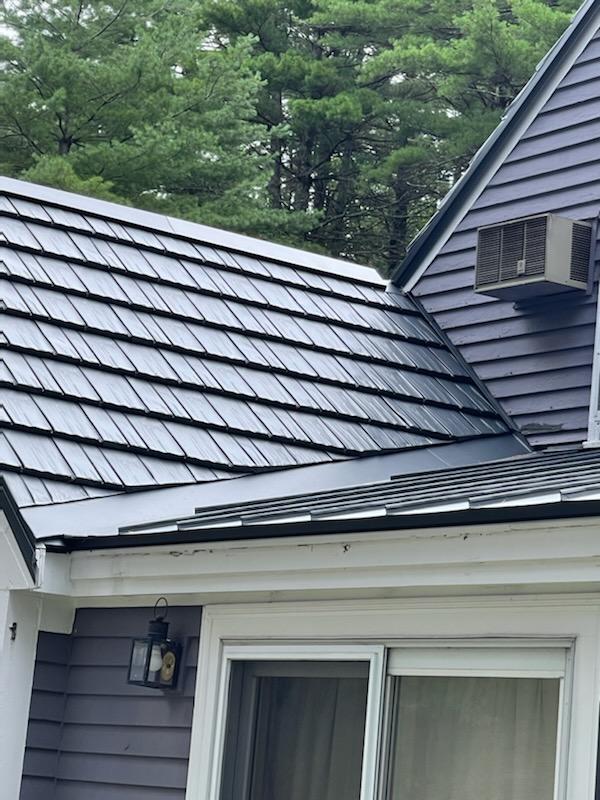Metal roofing can withstand greater snowfall than asphalt roofing in new England