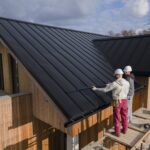 full shot roofers working together with helmets (1)